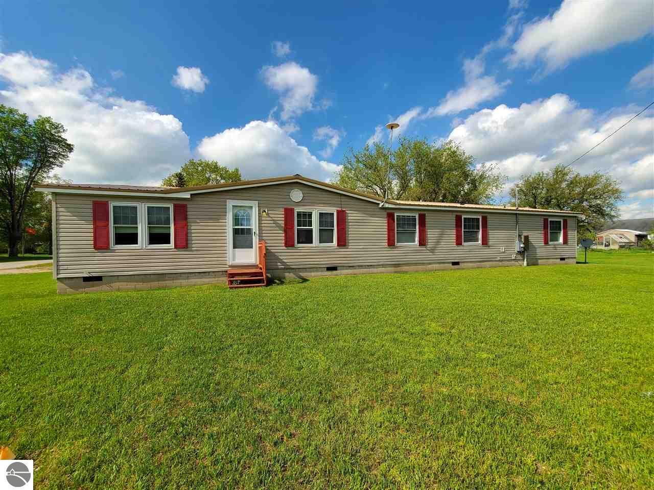 Property Photo:  207 Myrtle Street  MI 49618 