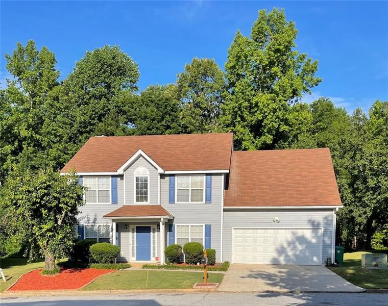 Property Photo: 6011 Kingston Wood Way GA 30038