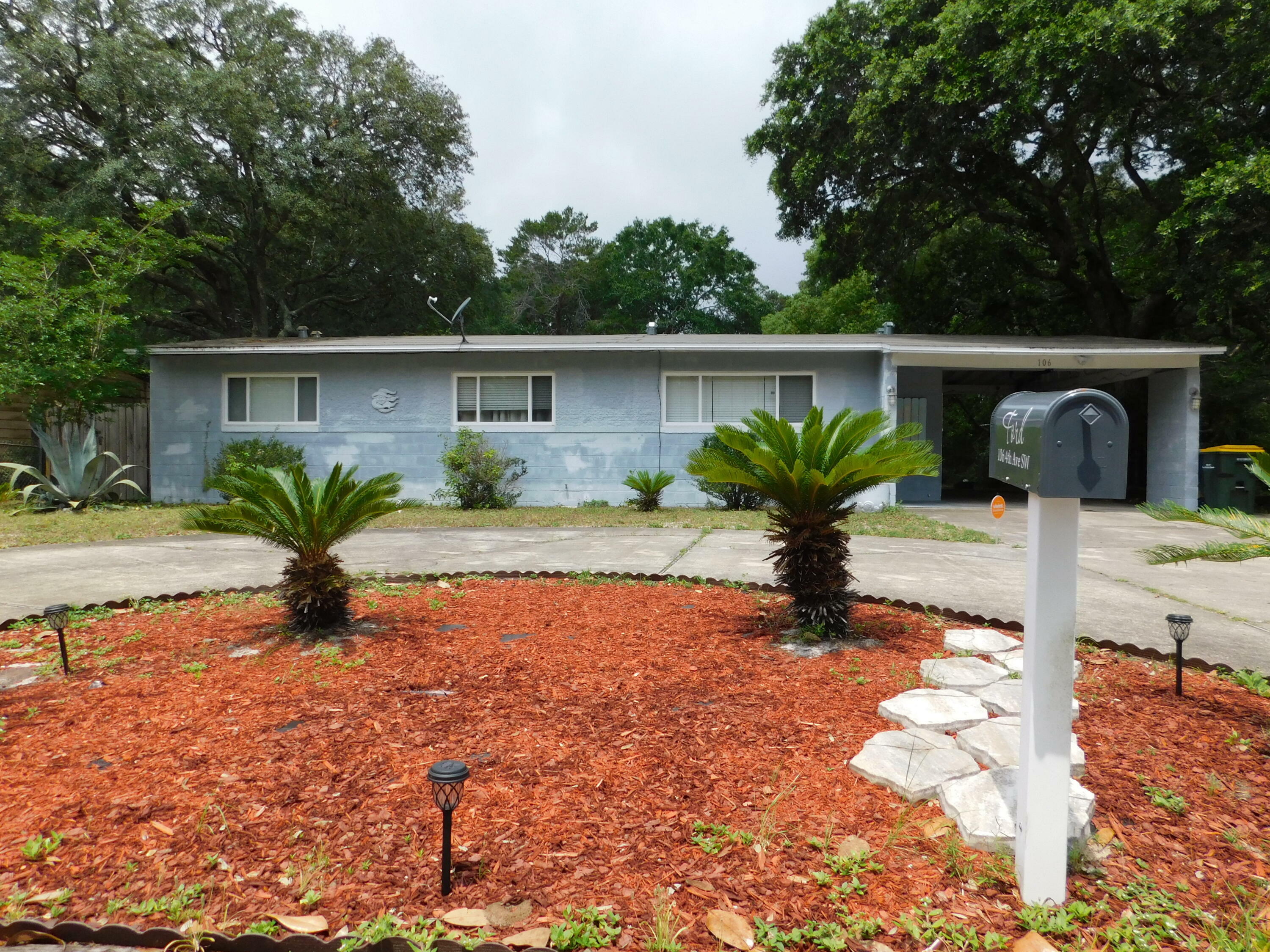 Property Photo:  106 SW 4th Avenue  FL 32548 