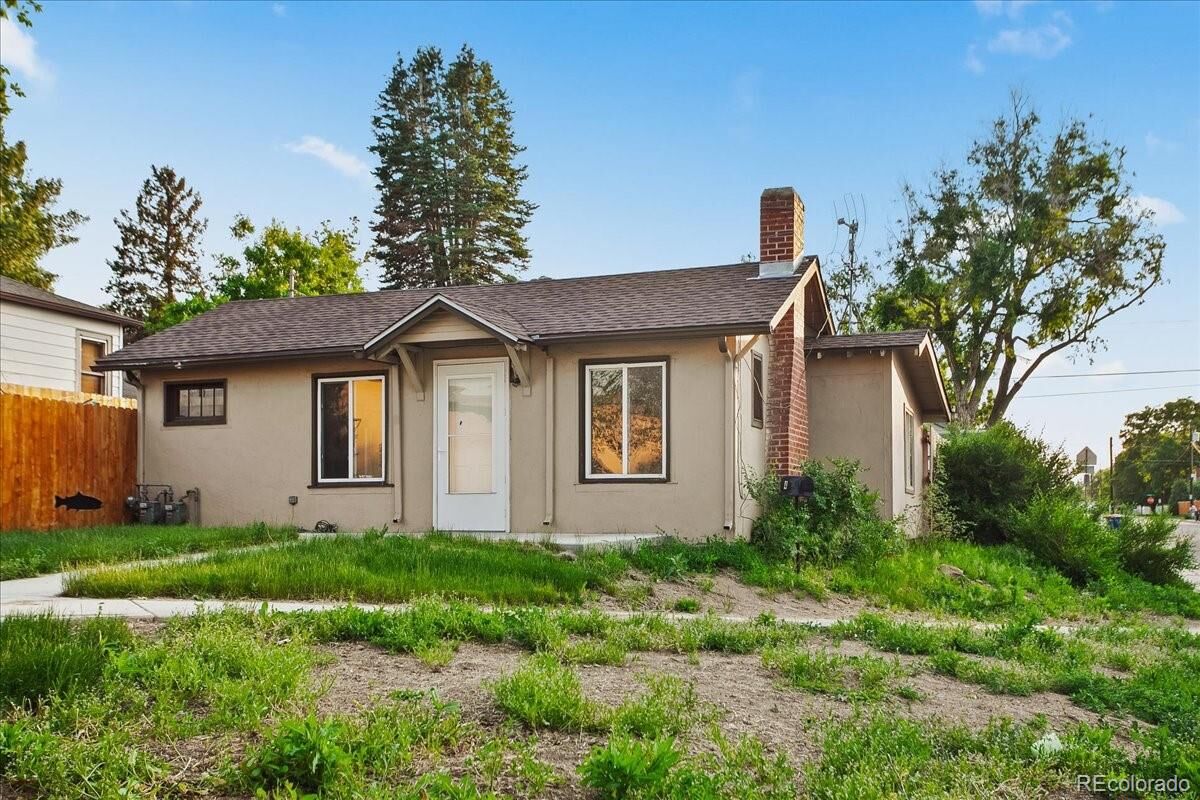 Property Photo:  3801 S Logan Street  CO 80113 