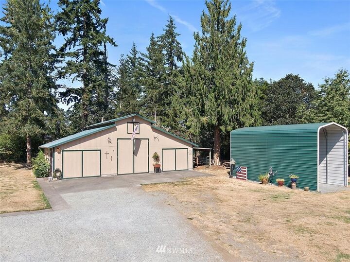 Property Photo:  17418  Waller Road E  WA 98446 