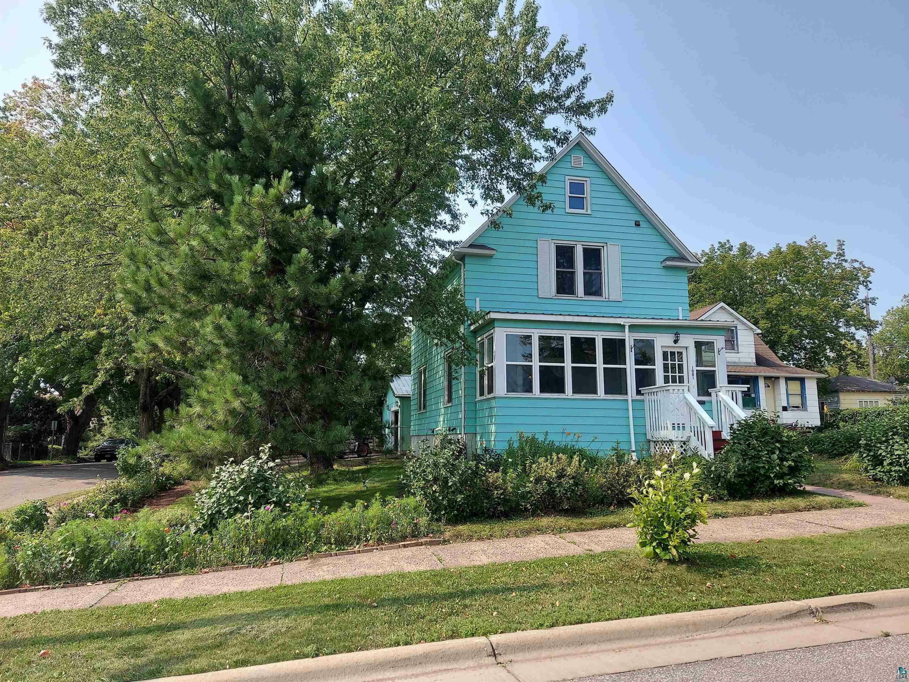 Property Photo:  1001 N 9th Ave E  MN 55805 