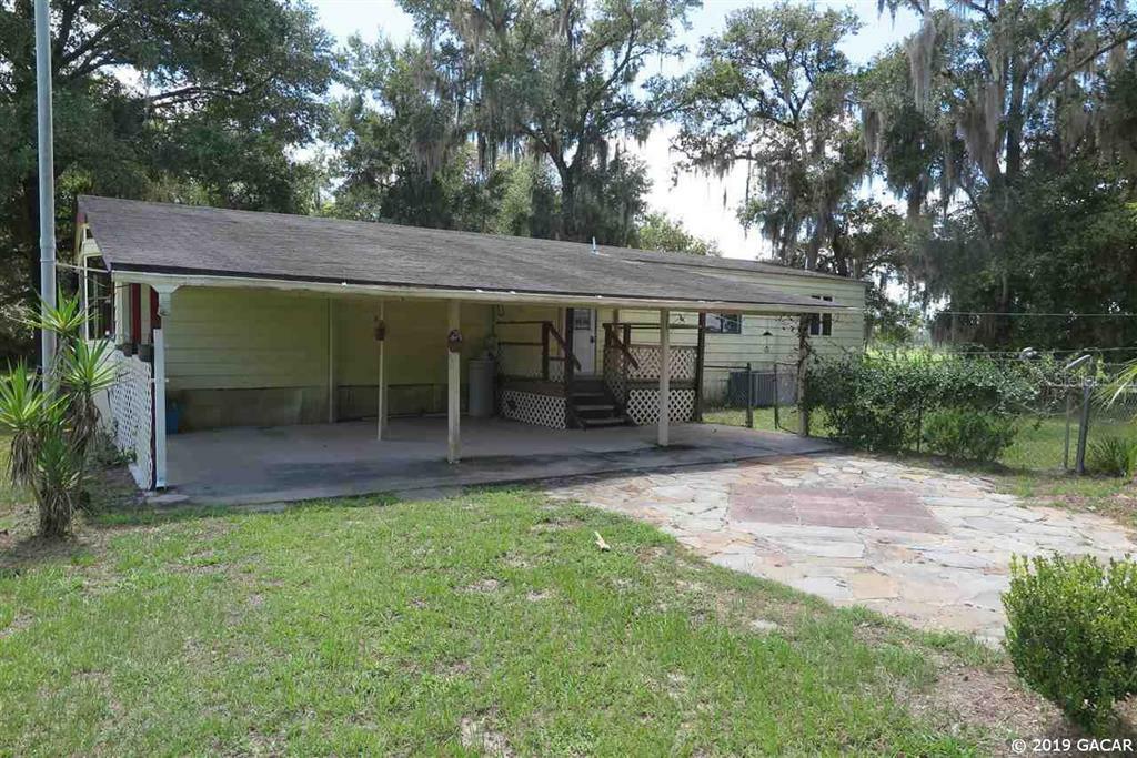 Property Photo:  105 Sabal Palm Drive  FL 32139 