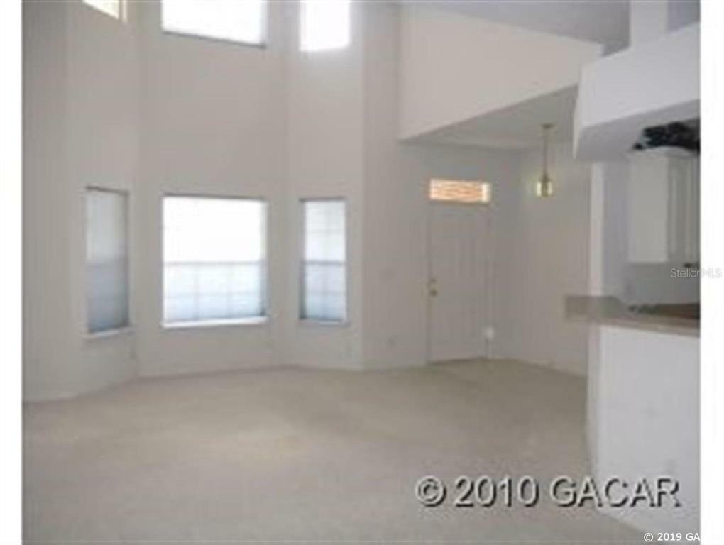 Property Photo:  4946 NW 1st Place  FL 32607 