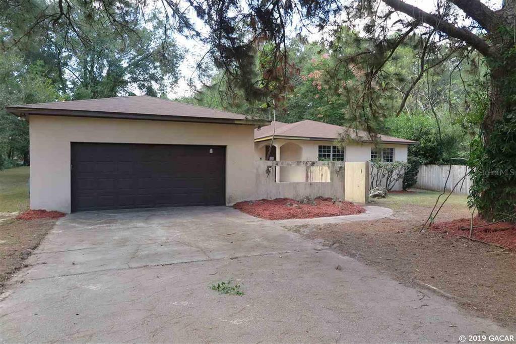 Property Photo:  100 NW 122nd Street  FL 32607 