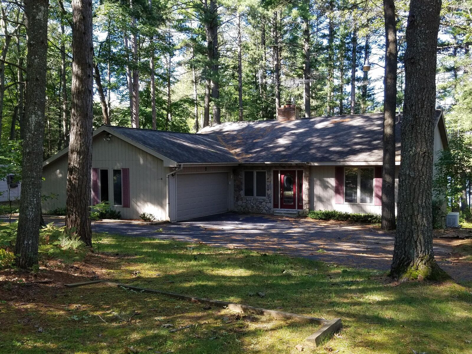 Property Photo:  6796 Larkspur Lane  MI 49751 