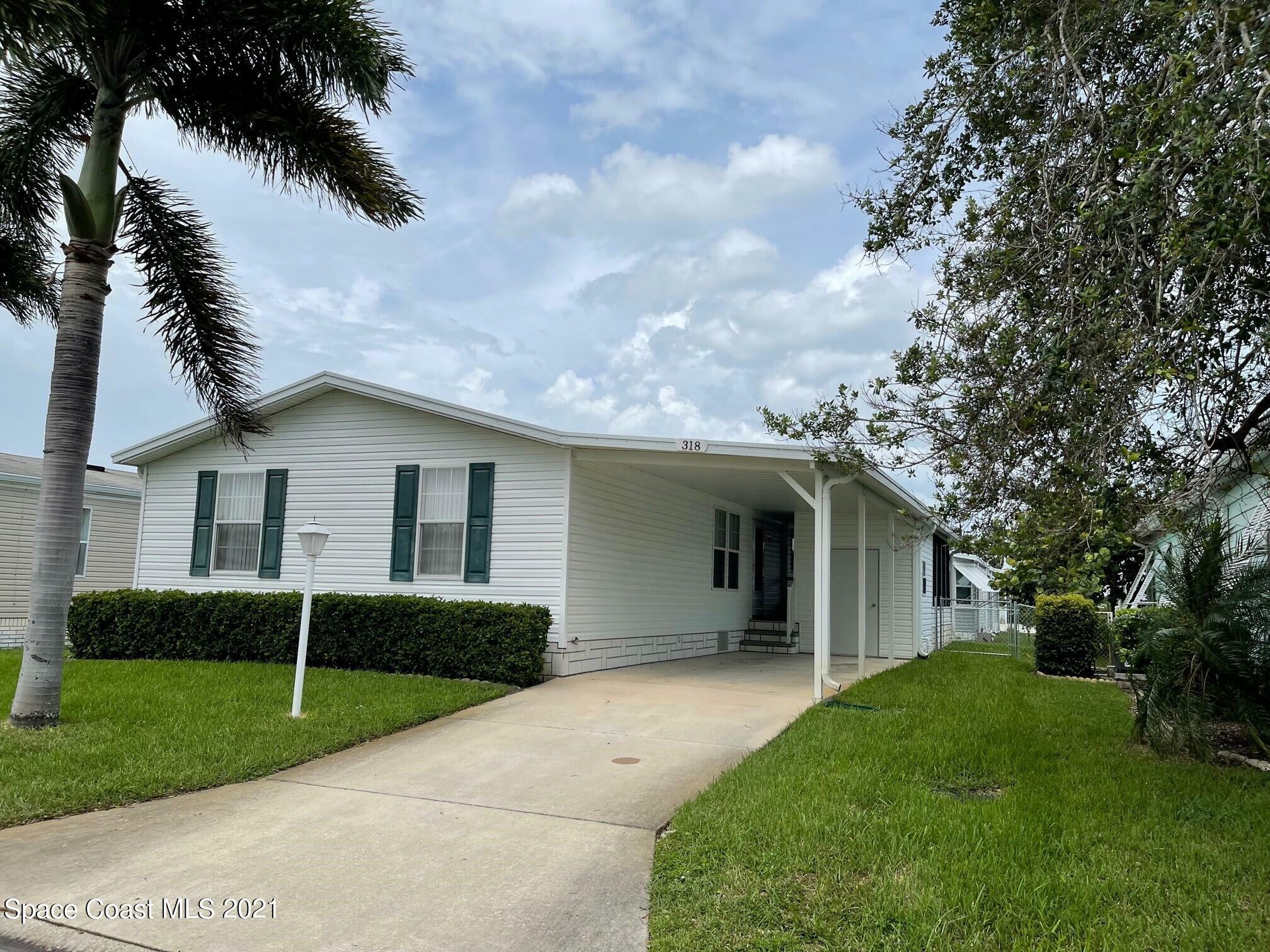 Property Photo:  318 Macadamia Drive  FL 32976 