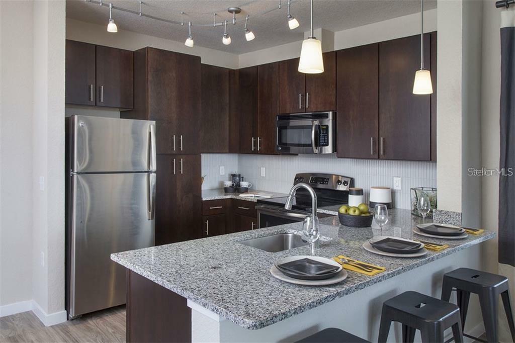 Property Photo:  10207- 1B Dwell Court  FL 32832 