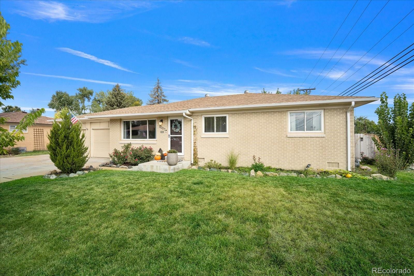 Property Photo:  3007 W Saratoga Avenue  CO 80110 