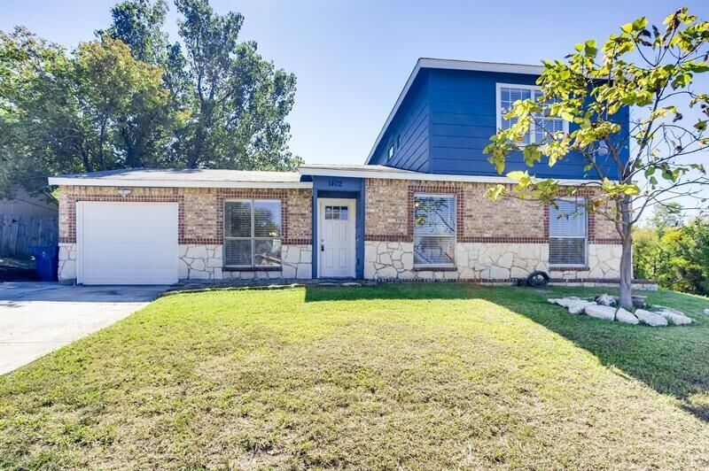 Property Photo: 1402 High Meadow Drive TX 75040