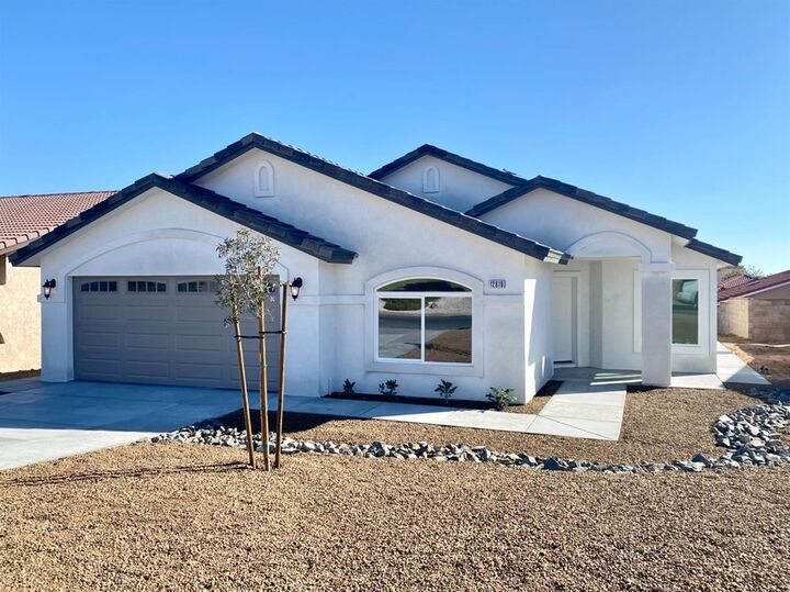 Property Photo: 12813 Autumn Leaves Avenue CA 92395