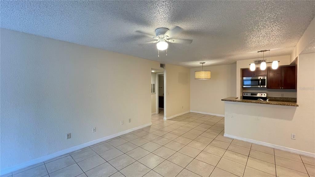 Property Photo:  5120 Conroy Road 13  FL 32811 