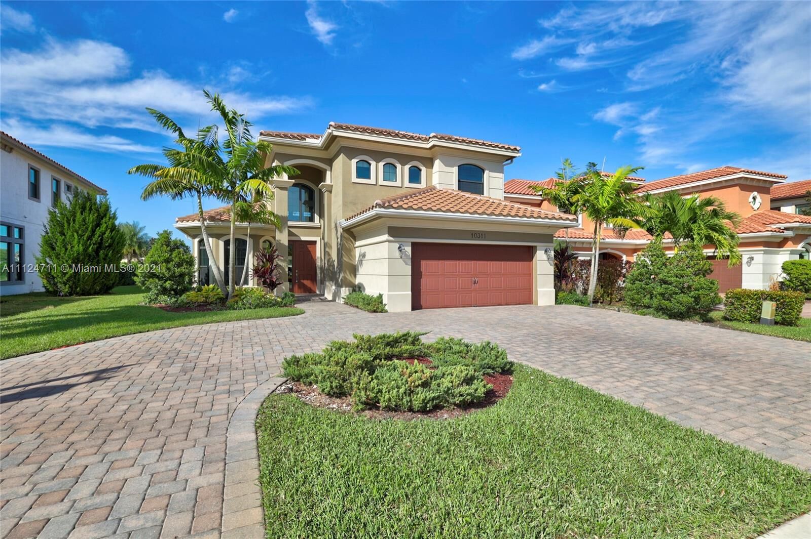 Property Photo:  10311 Sweet Bay Ct  FL 33076 