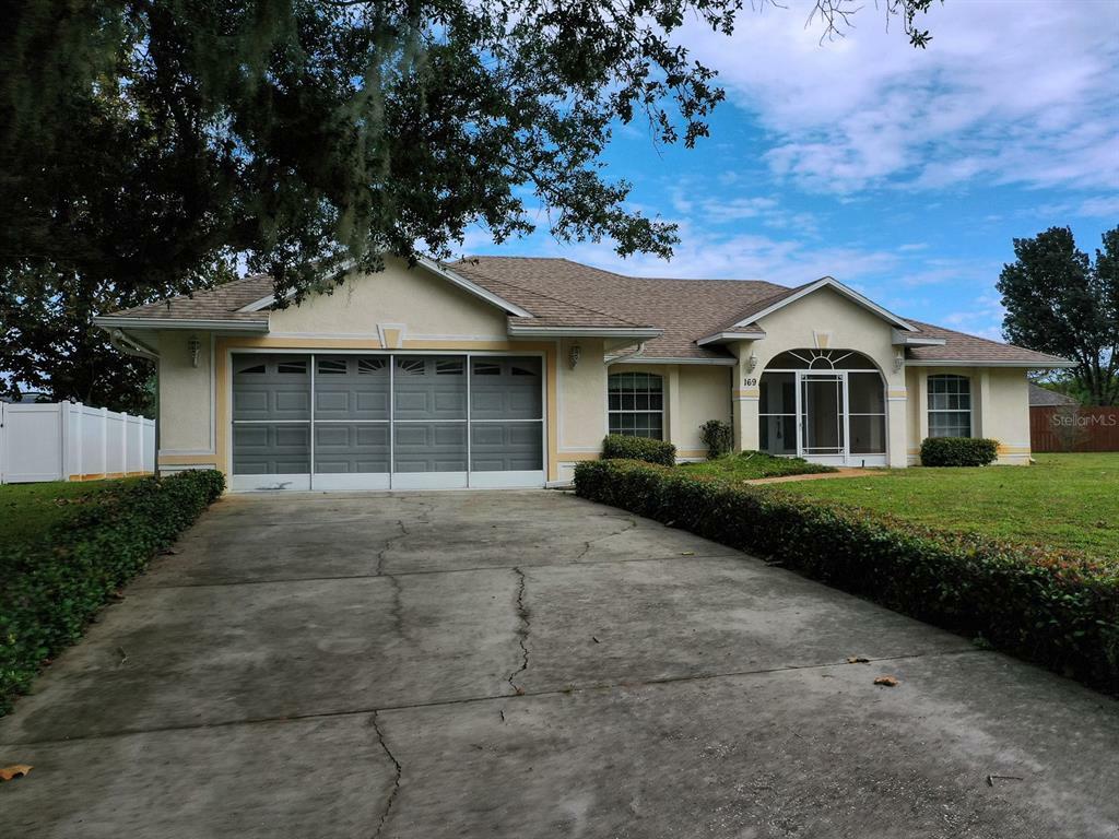 Property Photo:  169 Country Lakes Circle  FL 34736 