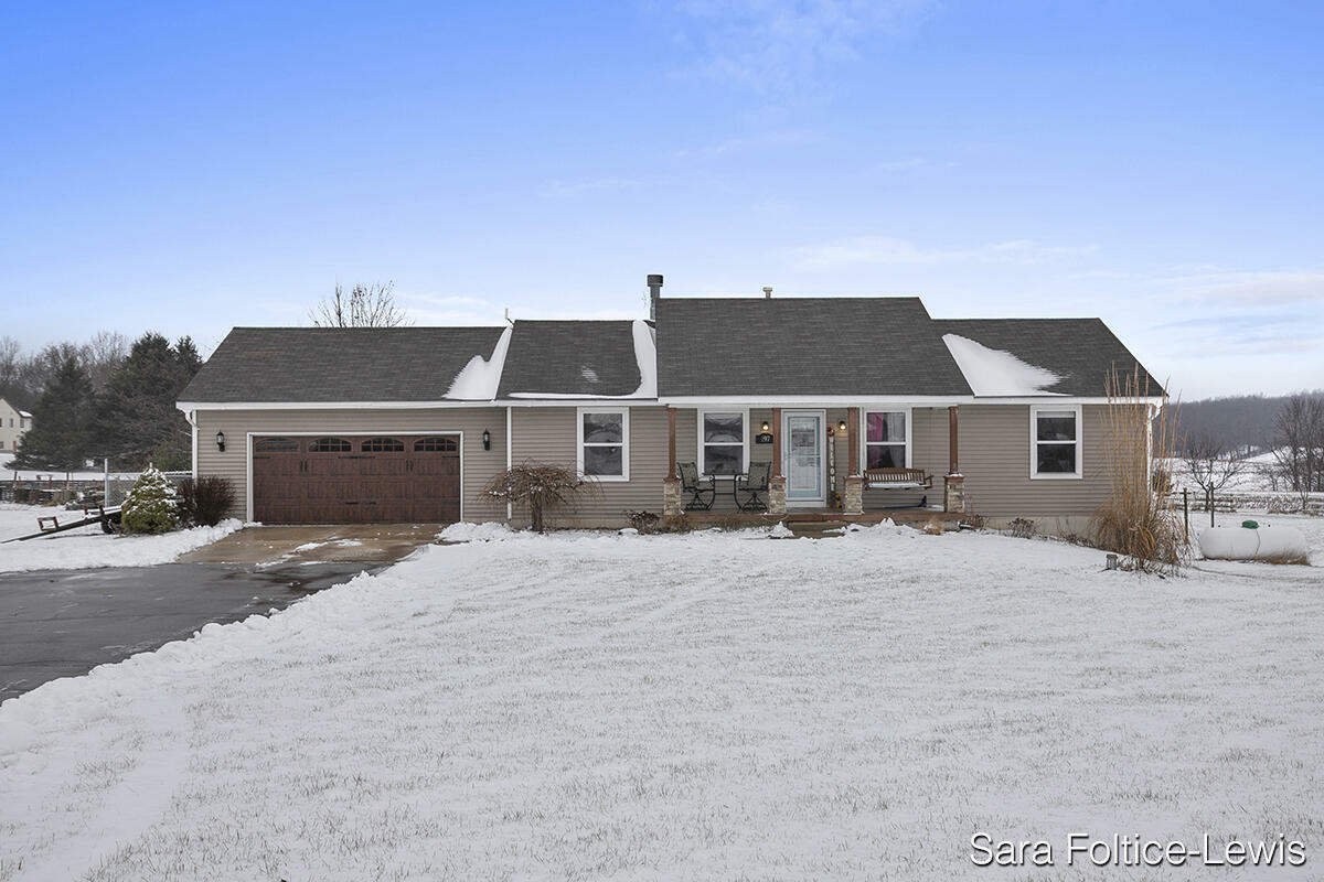 Property Photo:  297 Farmstead Drive SE  MI 49331 