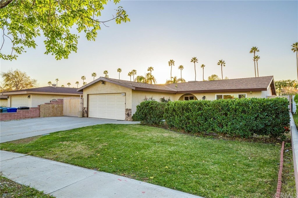 Property Photo:  9536 Tangelo Avenue  CA 92335 