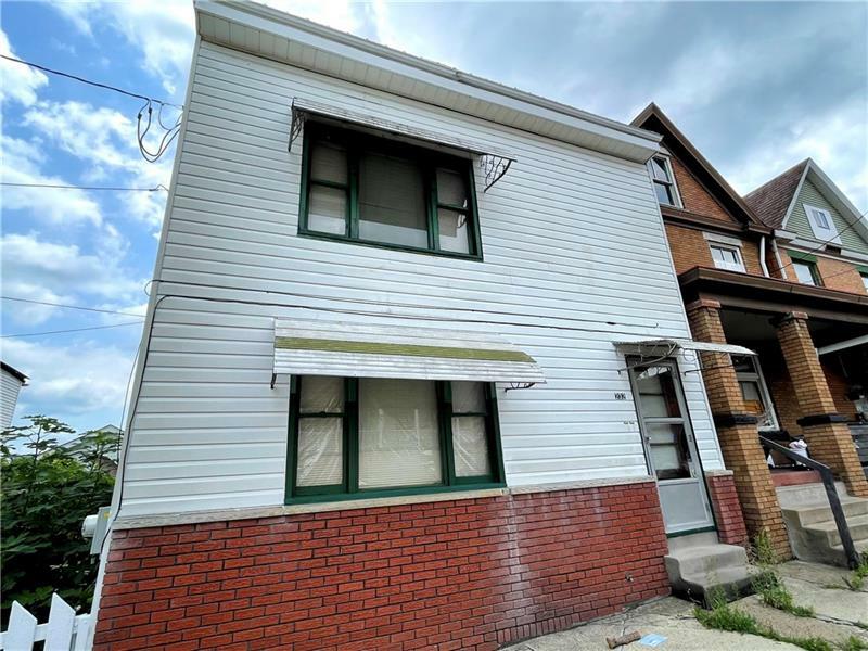 Property Photo:  232 McKean 1  PA 15033 