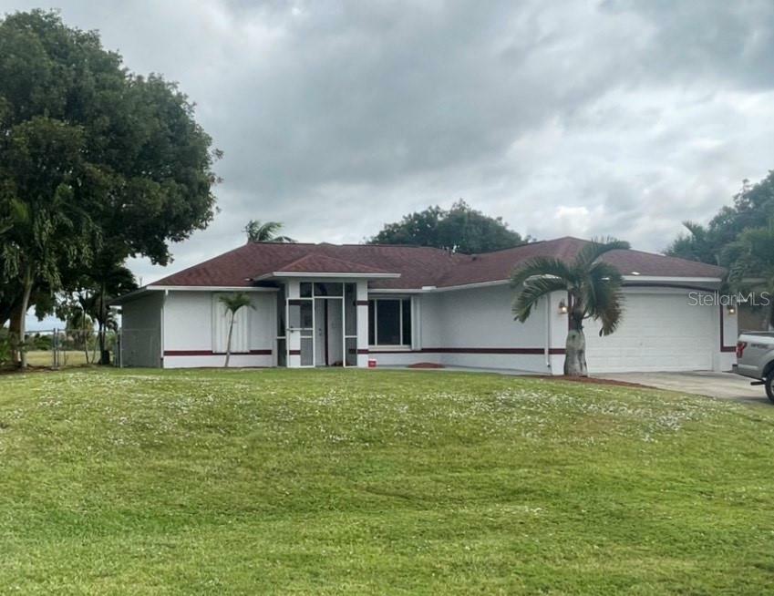 Property Photo:  911 NW 20th Avenue  FL 33993 