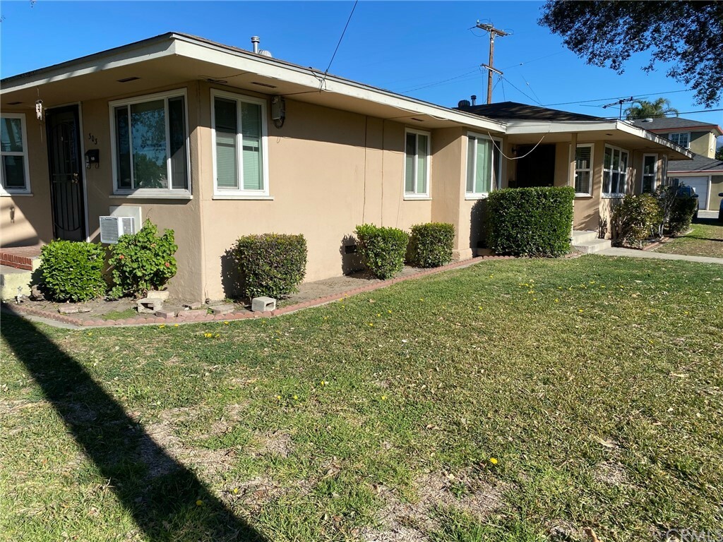 Property Photo:  303 W Artesia Street  CA 91768 