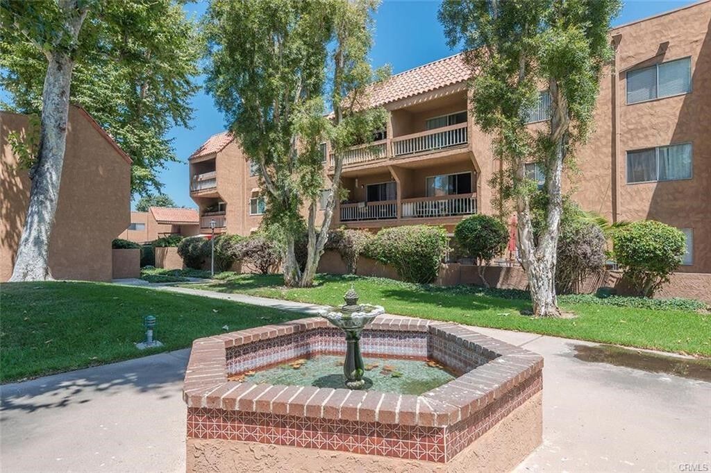 Property Photo:  6600 Warner Avenue 135  CA 92647 
