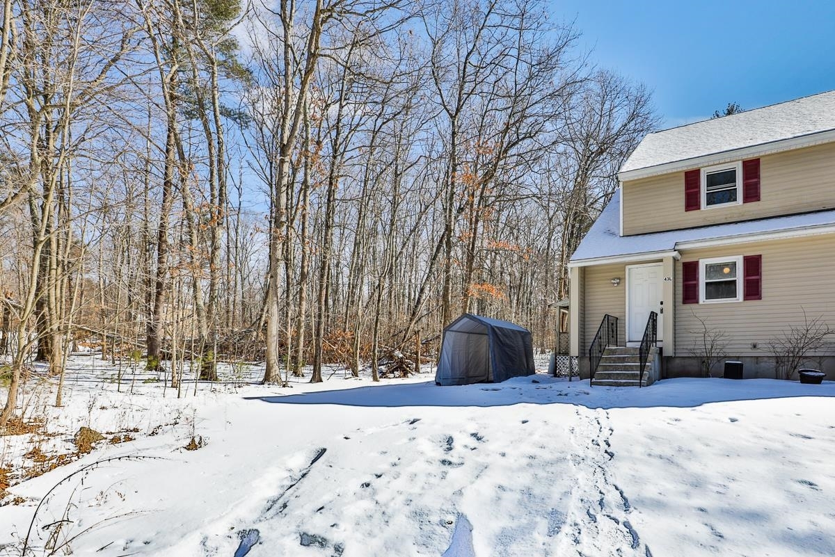 Property Photo:  43 Pingree Hill Road L  NH 03038 