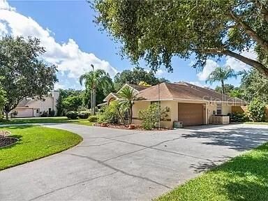 Property Photo:  6503 Longoak Court  FL 33811 