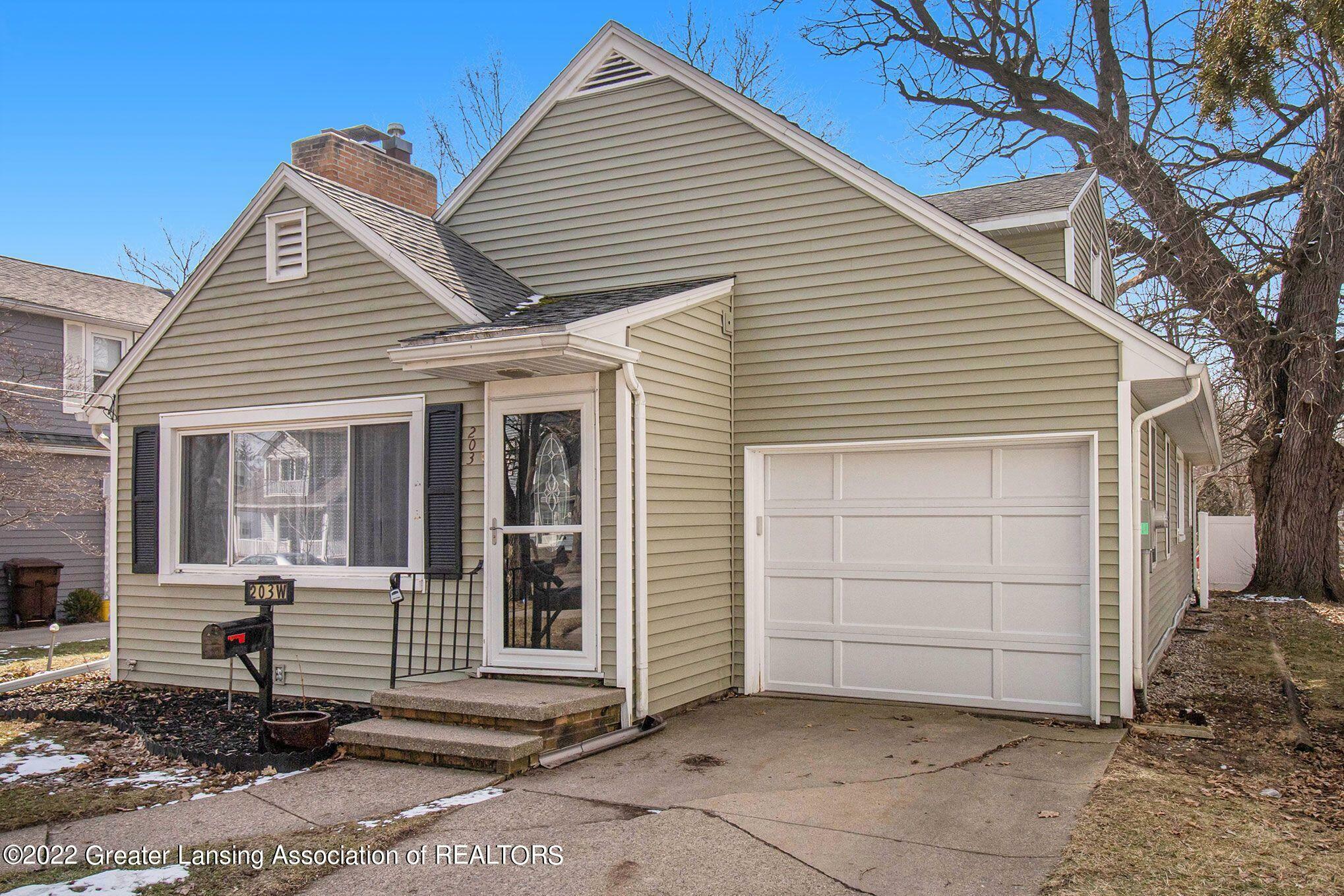 Property Photo:  203 W Henry Street  MI 48813 