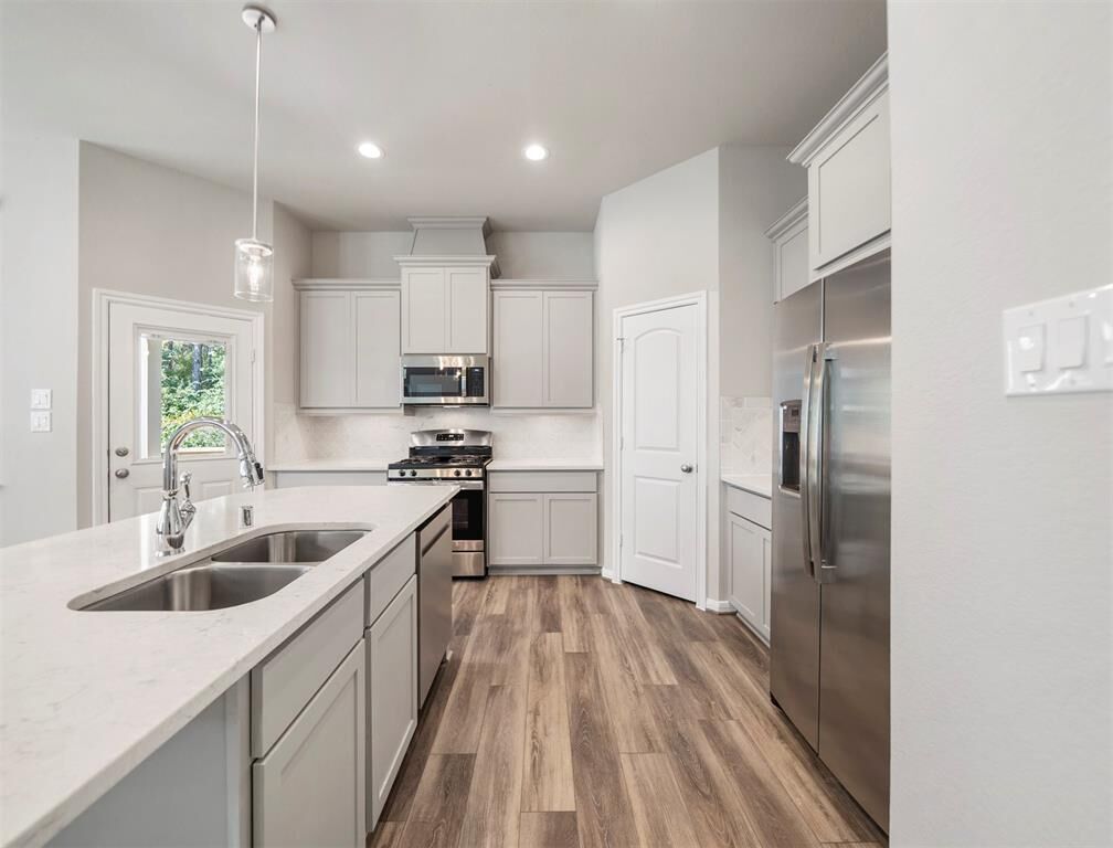 Property Photo: 1534 Rustling Creek Drive TX 77459