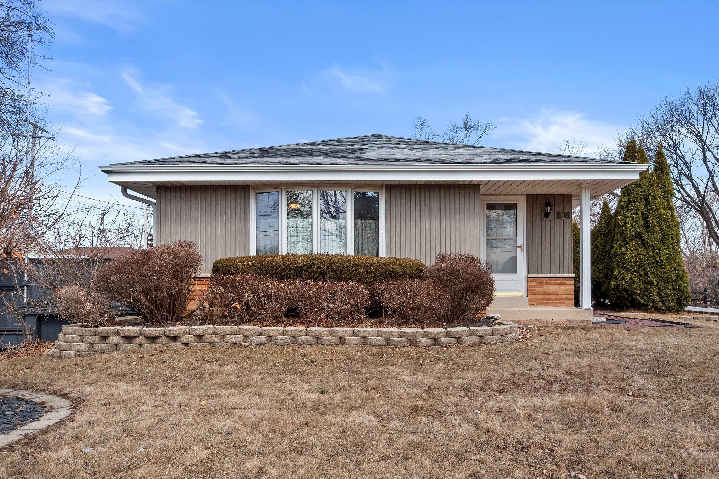 Property Photo: 8802 W Cold Spring Rd WI 53228