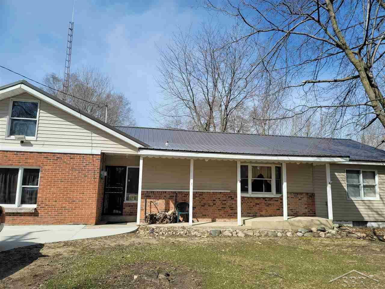 Property Photo:  8740 Sheridan Rd  MI 48746 