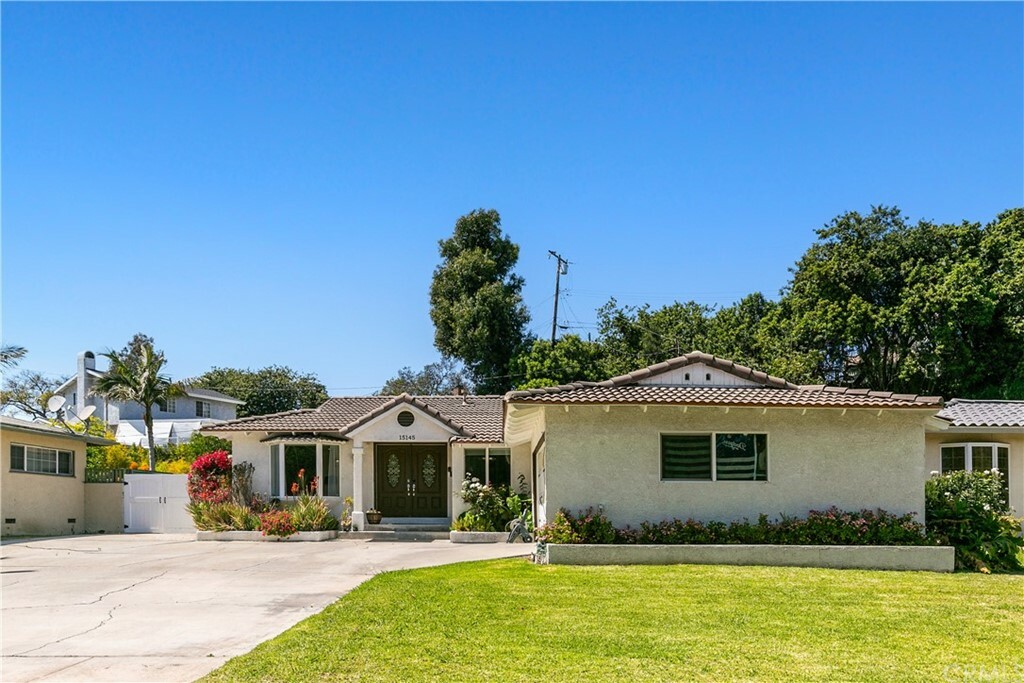 Property Photo:  15145 Las Flores Avenue  CA 90638 