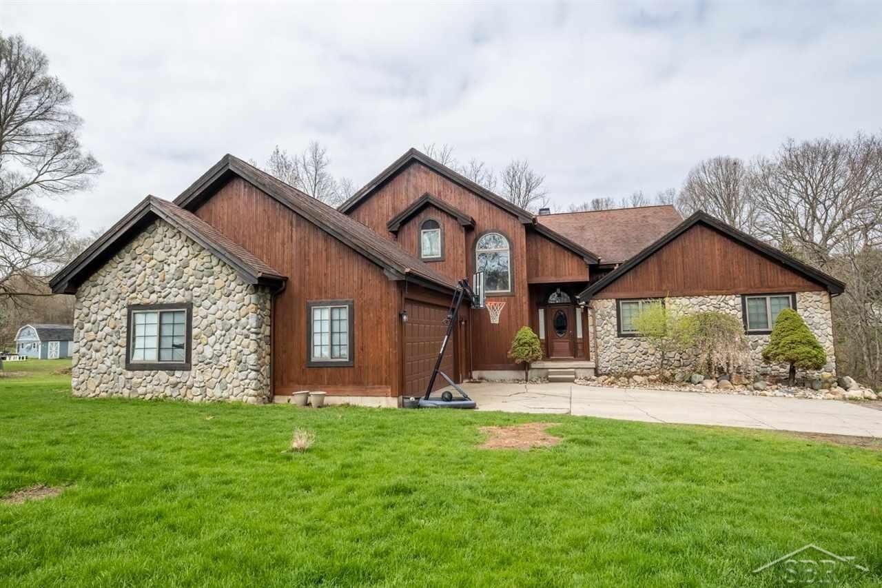 Property Photo:  8117 N McKinley  MI 48433 