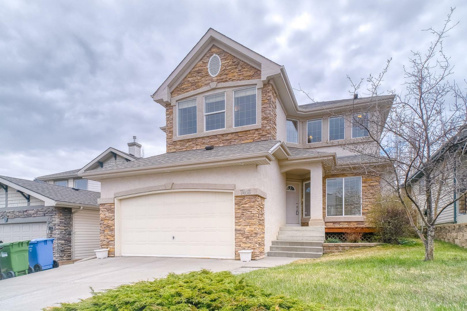 Property Photo: 7416 Springbank Way SW AB T3H 4V3