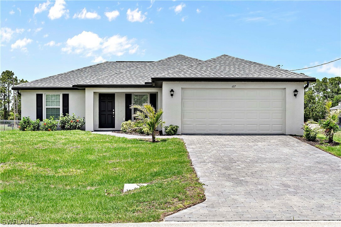 Property Photo:  607 NW 32nd Street  FL 33993 