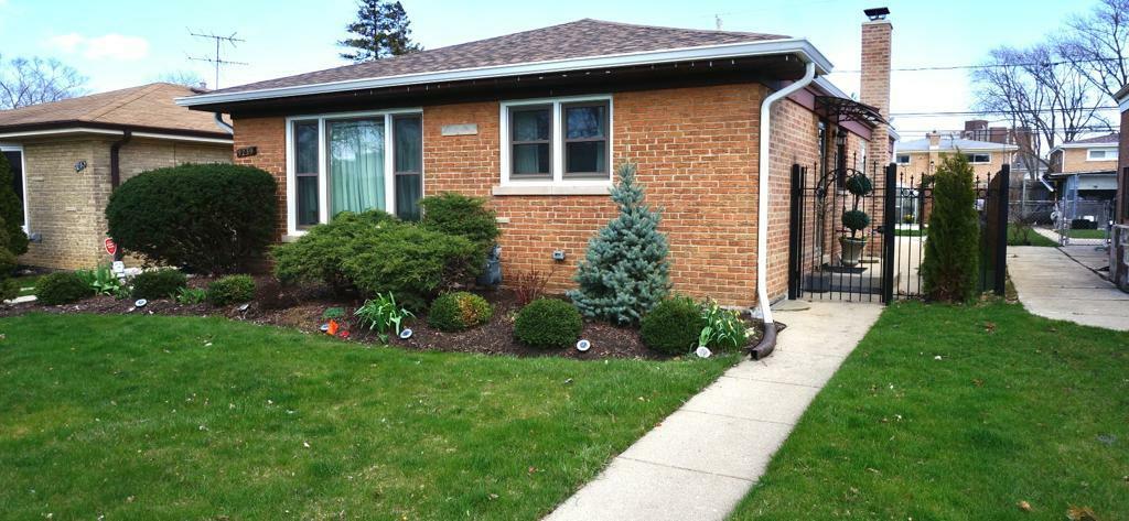 Property Photo:  9239 Lawler Avenue  IL 60077 