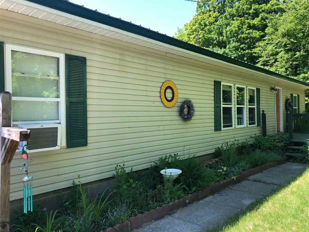 Property Photo:  5125 Zmikly  MI 49769 