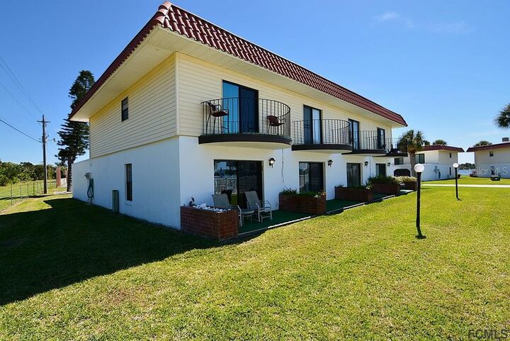 Property Photo:  86 Ocean Palm Villas S 86  FL 32136 