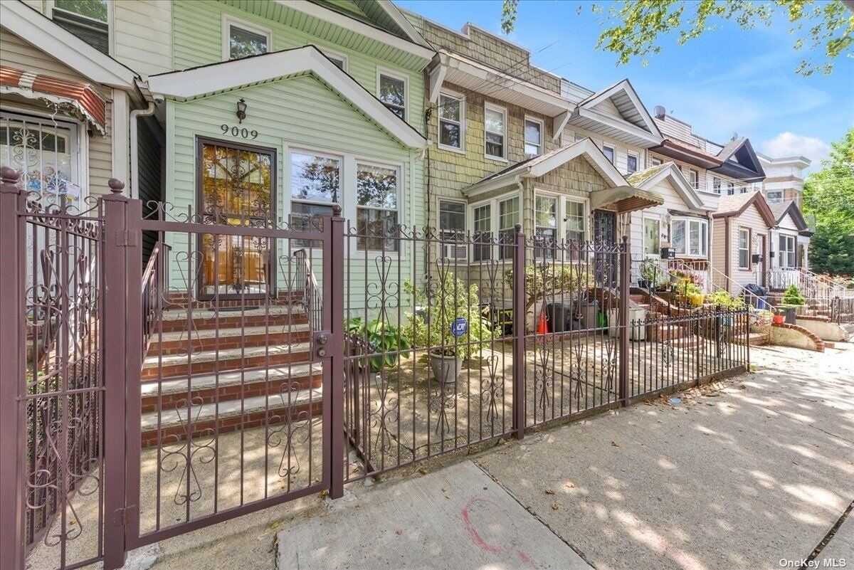 Property Photo:  90-09 80th Street  NY 11421 