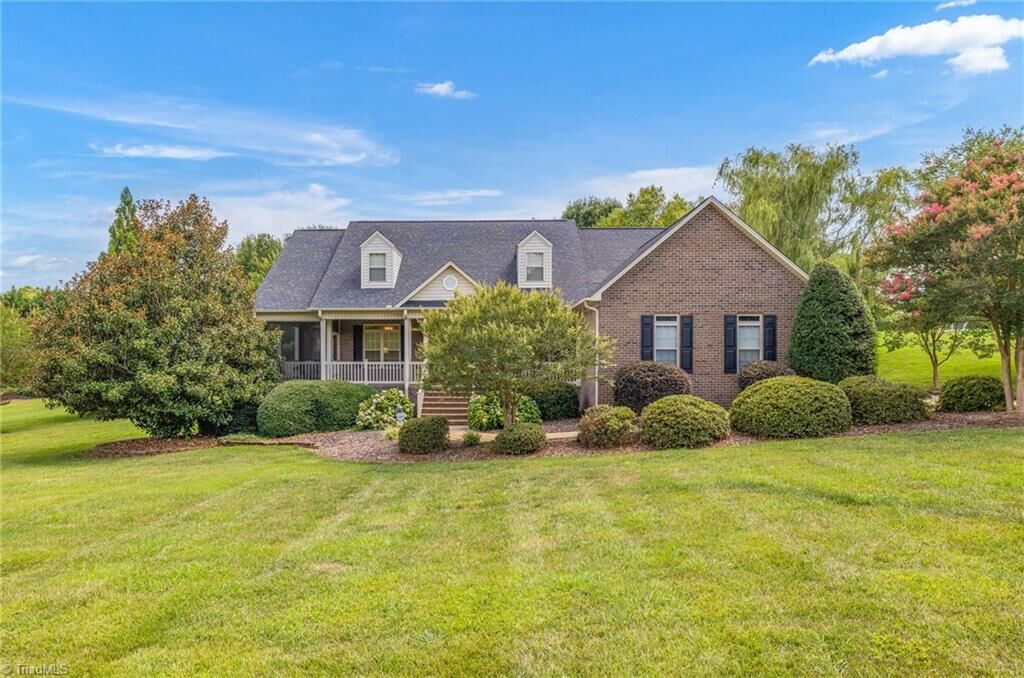 Property Photo: 7133 Hunters Club Drive NC 27370