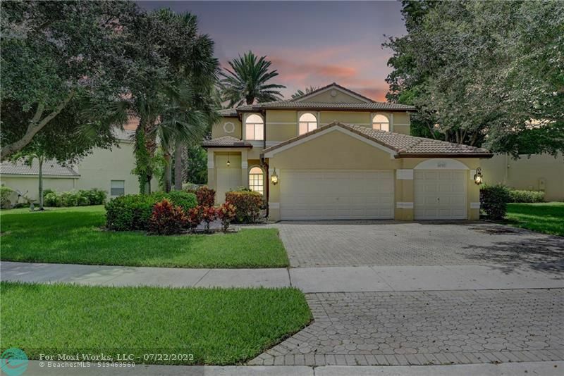 Property Photo:  4892 NW 59th Ct  FL 33073 