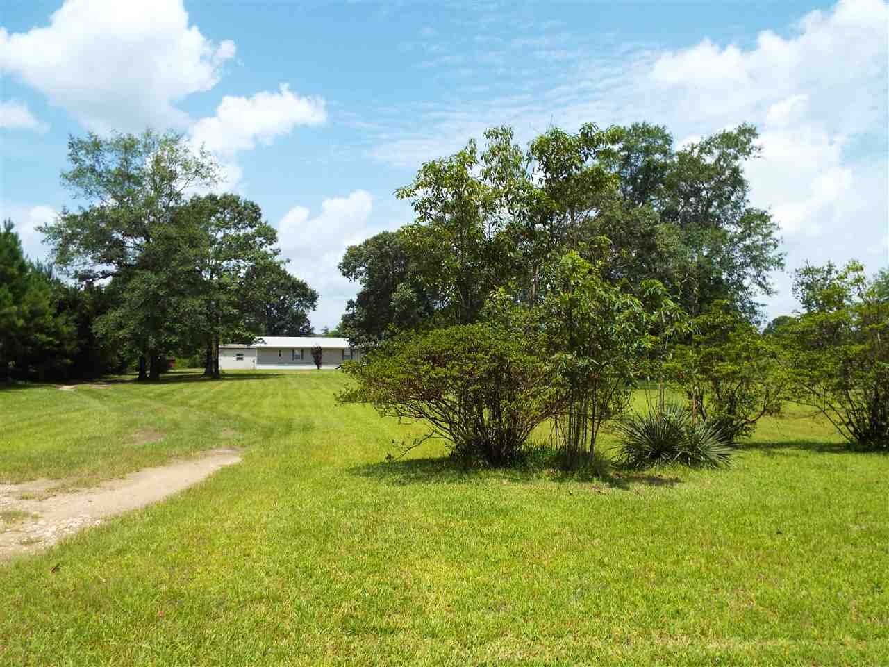 Property Photo:  1599 County Road 3111  TX 77612 