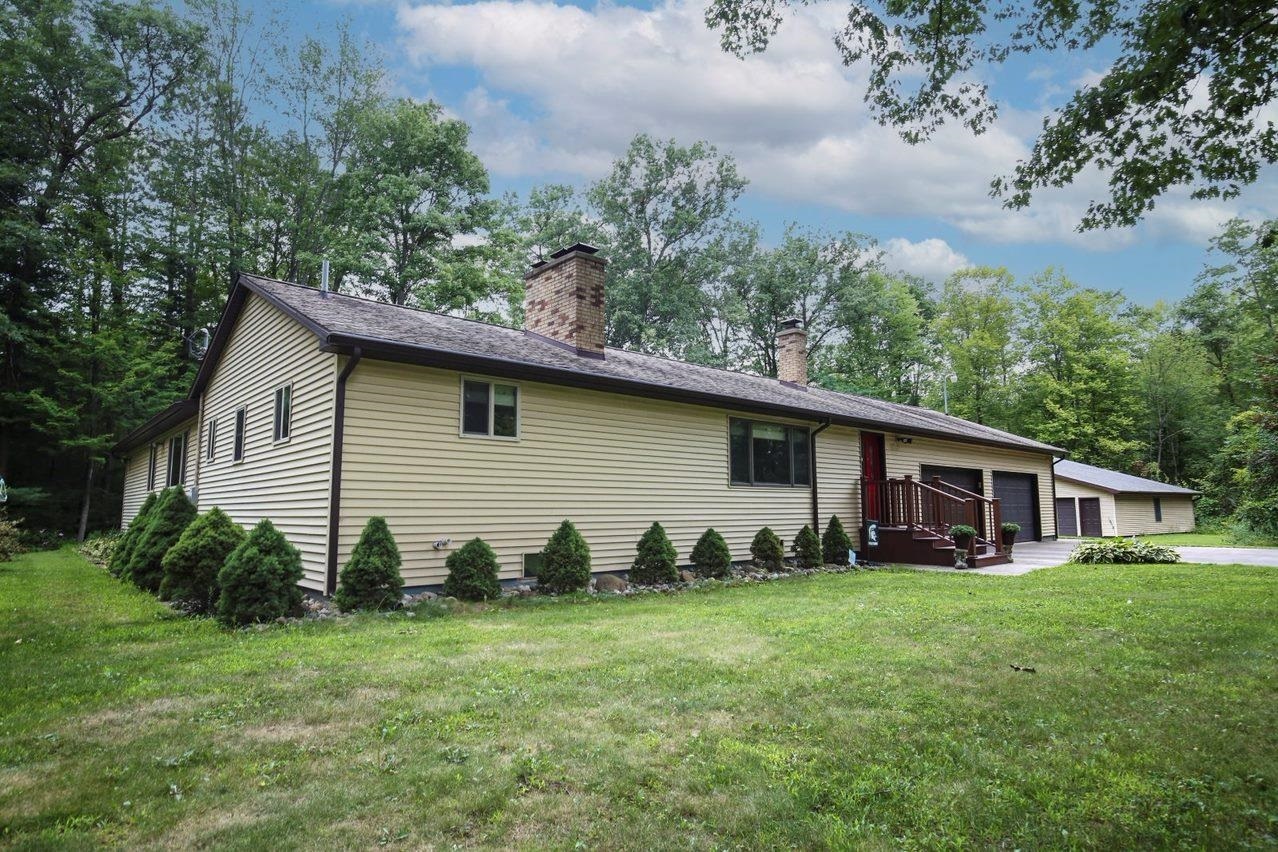 Property Photo:  599 N Eight Mile  MI 48640 