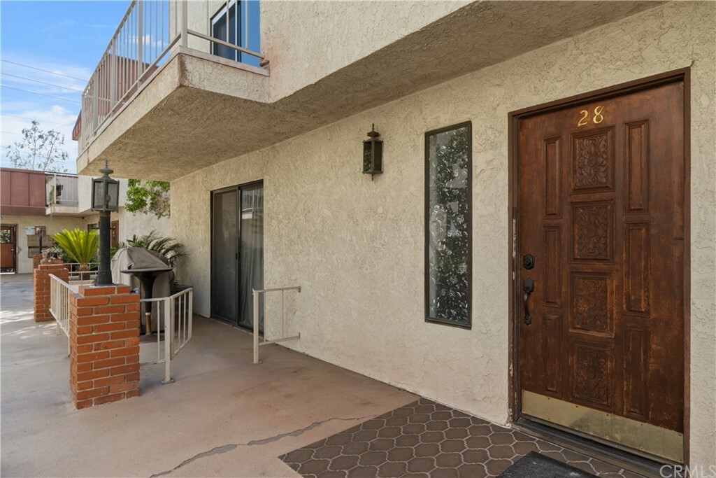 Property Photo:  9227 Florence Avenue 28  CA 90240 