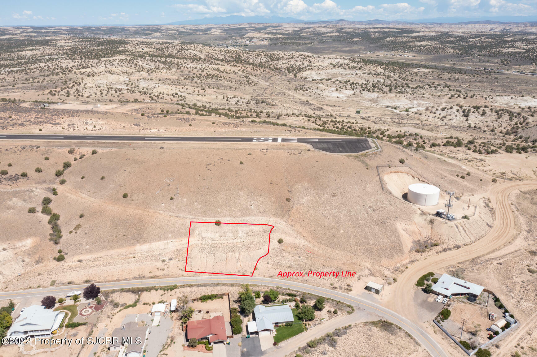 Property Photo:  705 Airport Drive  NM 87410 