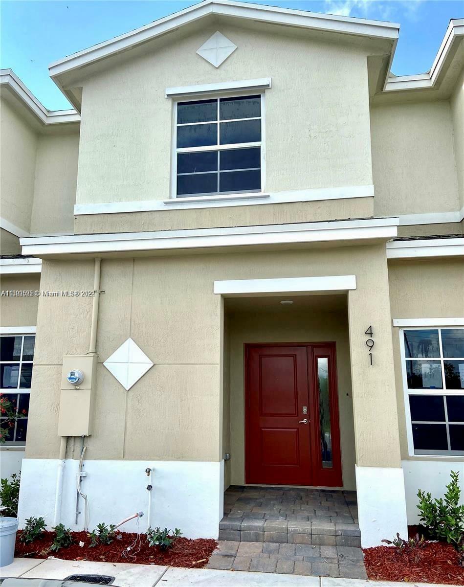 Property Photo:  491 NE 5th Way  FL 33034 