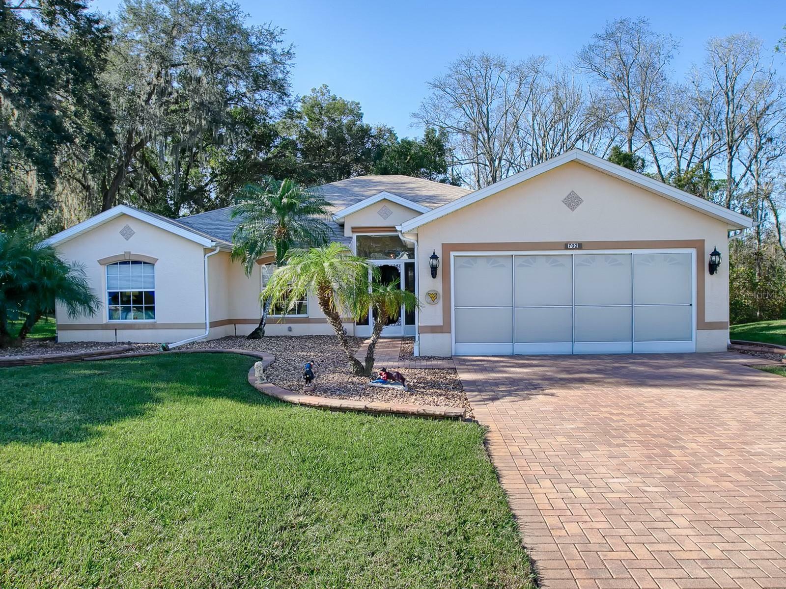 Property Photo:  702 Old Oaks Lane  FL 34748 