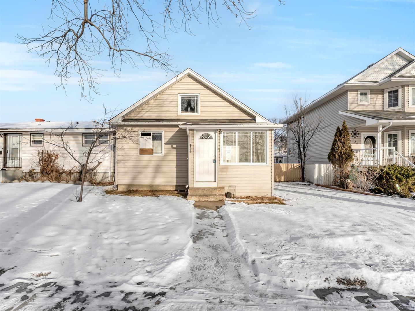 Property Photo: 144 5 Street SW AB T1A 4G6