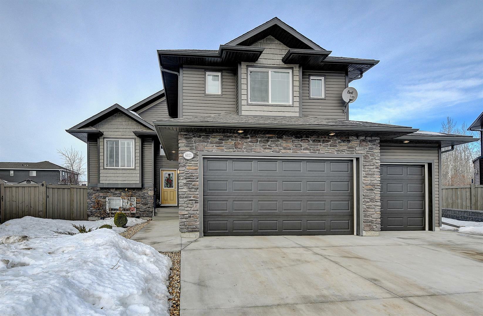Property Photo: 6021 112A Street AB T8W 0K6