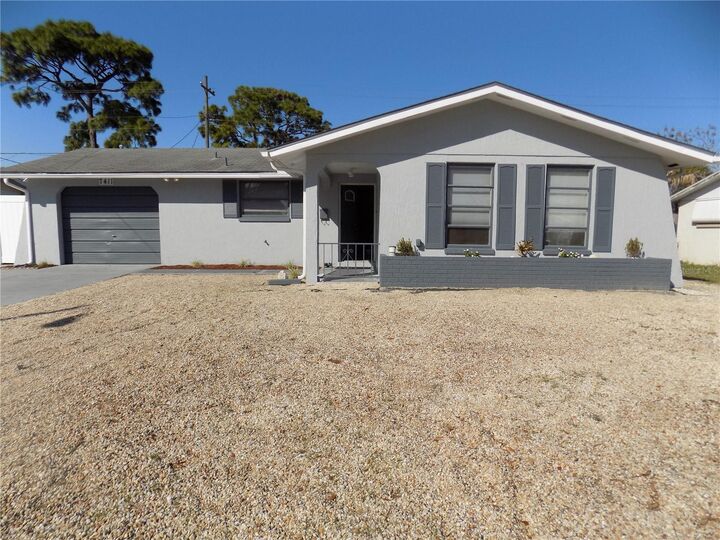 Property Photo:  7411 Sea Grape Avenue  FL 34654 