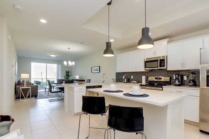 Property Photo: 4741 Clock Tower Drive 105 FL 34746